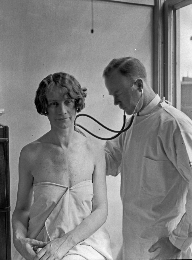 Doctor and patient./ Seattle municipal archives